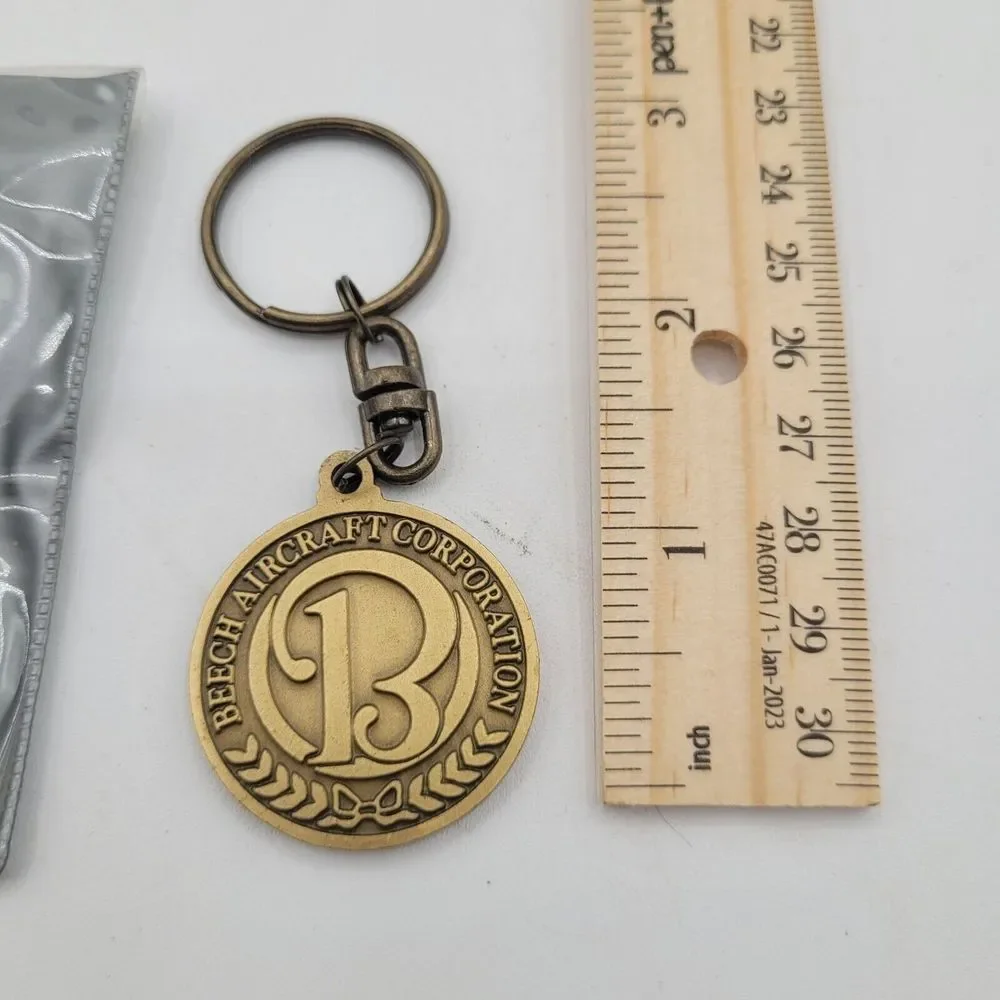Vtg Pendant Keychain: 1994 Beech Aircraft Beechcraft King Air 30th Anniversary‎
